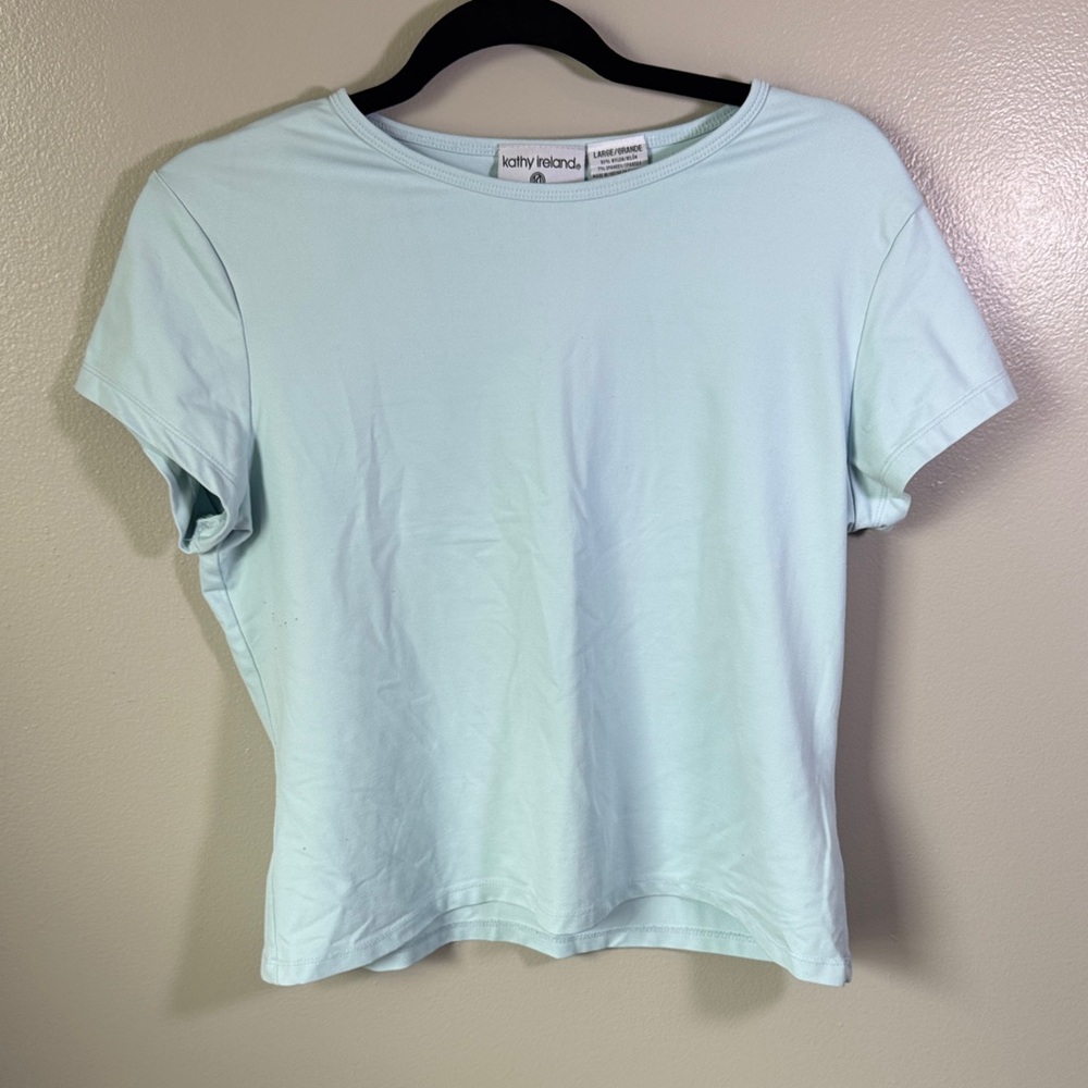 Women’s Kathy Ireland Soft Blue Nylon Short Sleeve Tee Size L